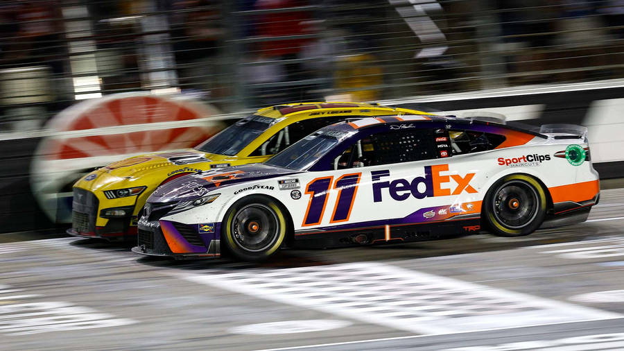 Denny Hamlin In Action Wallpaper