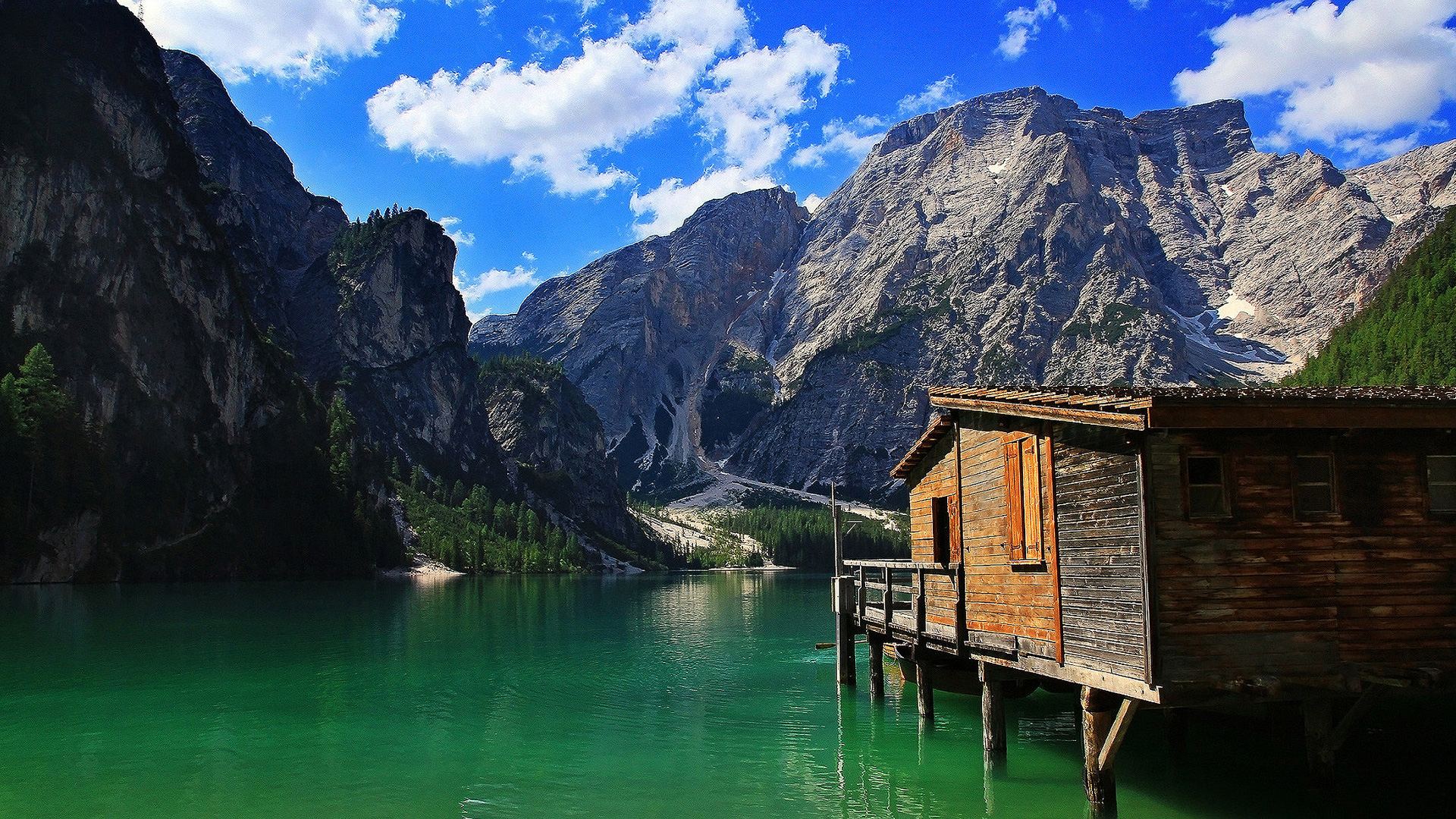 Stilt cabin on a mountain lake wallpaper   747350