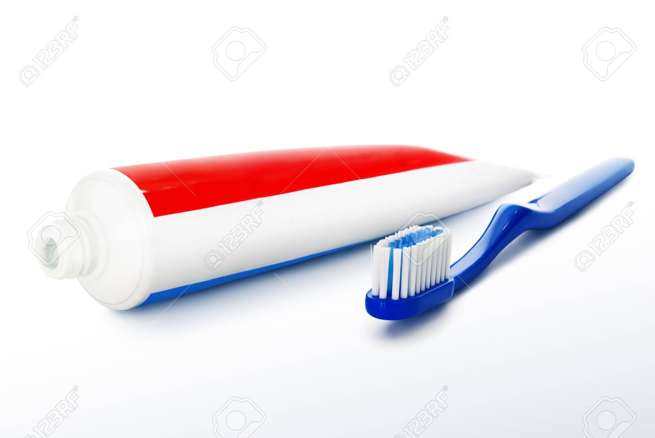 Toothbrush And Toothpaste Isolated On A White Background Stock