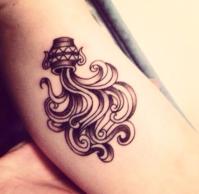 Tattoo Of Aquarius In The Form A Jug Water