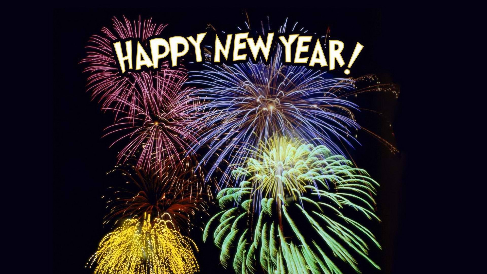 Fireworks exploding in the night sky with a 'Happy New Year' message overlayed on top