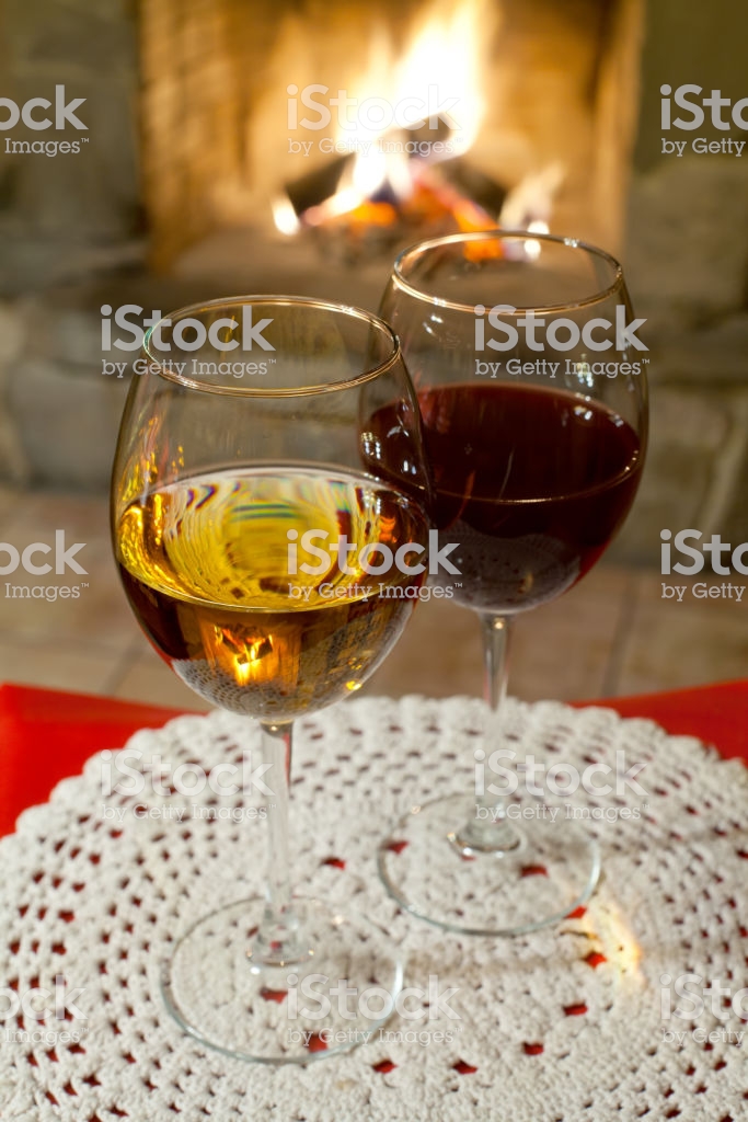Two Glasses Of Wine On White Tablecloth Fireplace Chimney