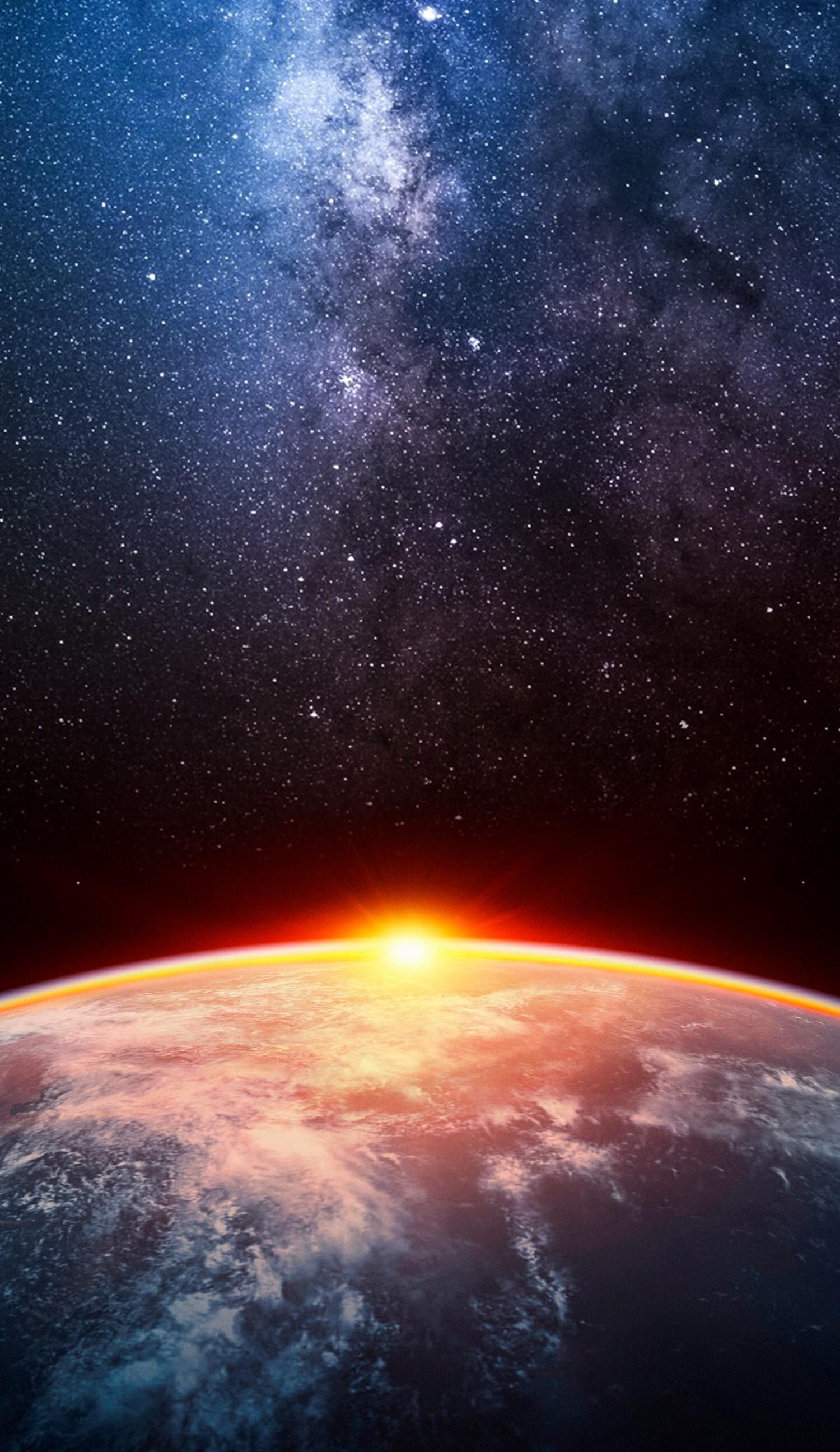 Sunrise over Earth from space with the Milky Way galaxy in the background. Universe iPhone wallpaper