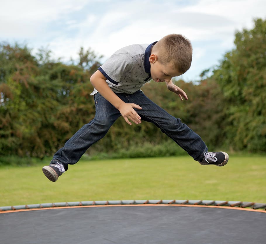 HD Wallpaper Boy Playing On Trampoline During Daytime Little