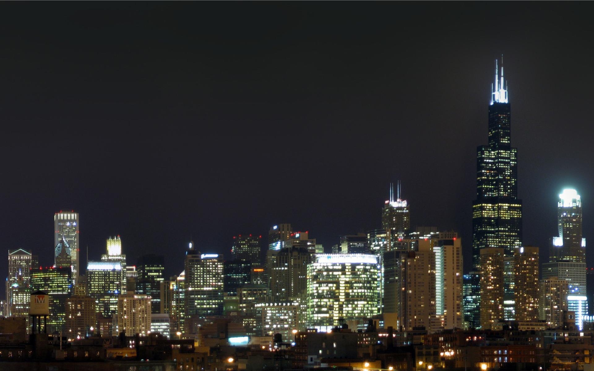 Chicago skyline at night with Willis Tower prominently featured