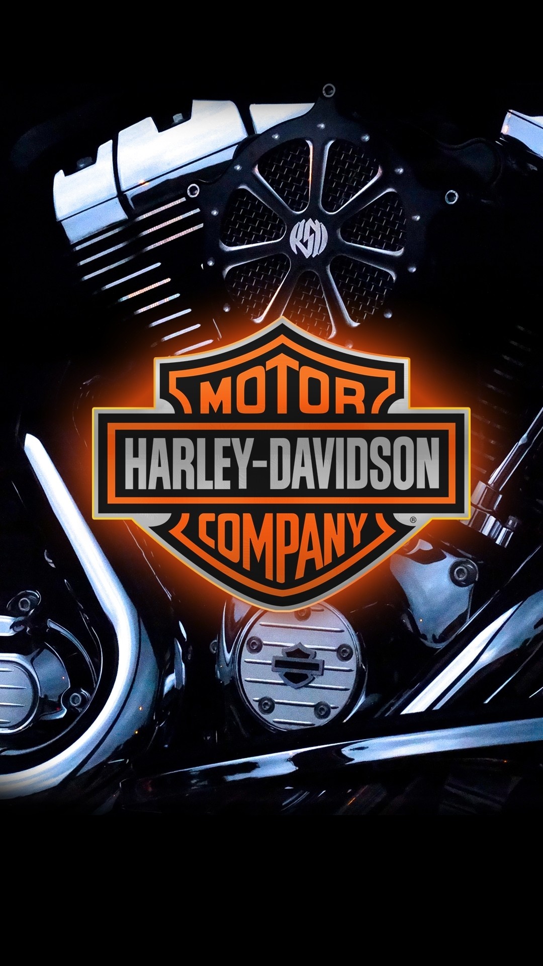 Close-up of a Harley-Davidson engine, showcasing the iconic logo and intricate details