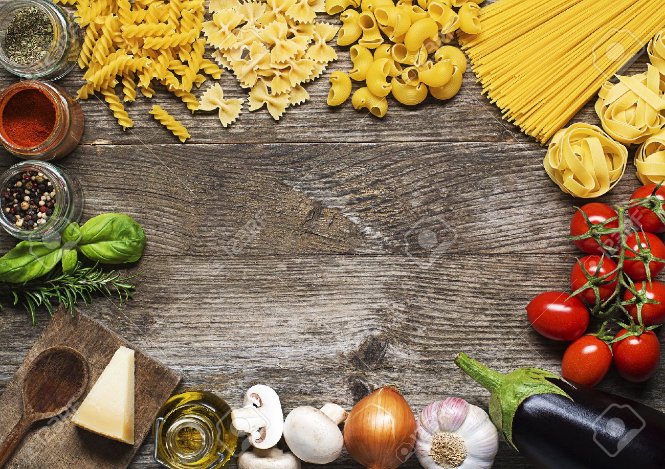 Raw Pasta With Ingredients On Wooden Background Stock Photo