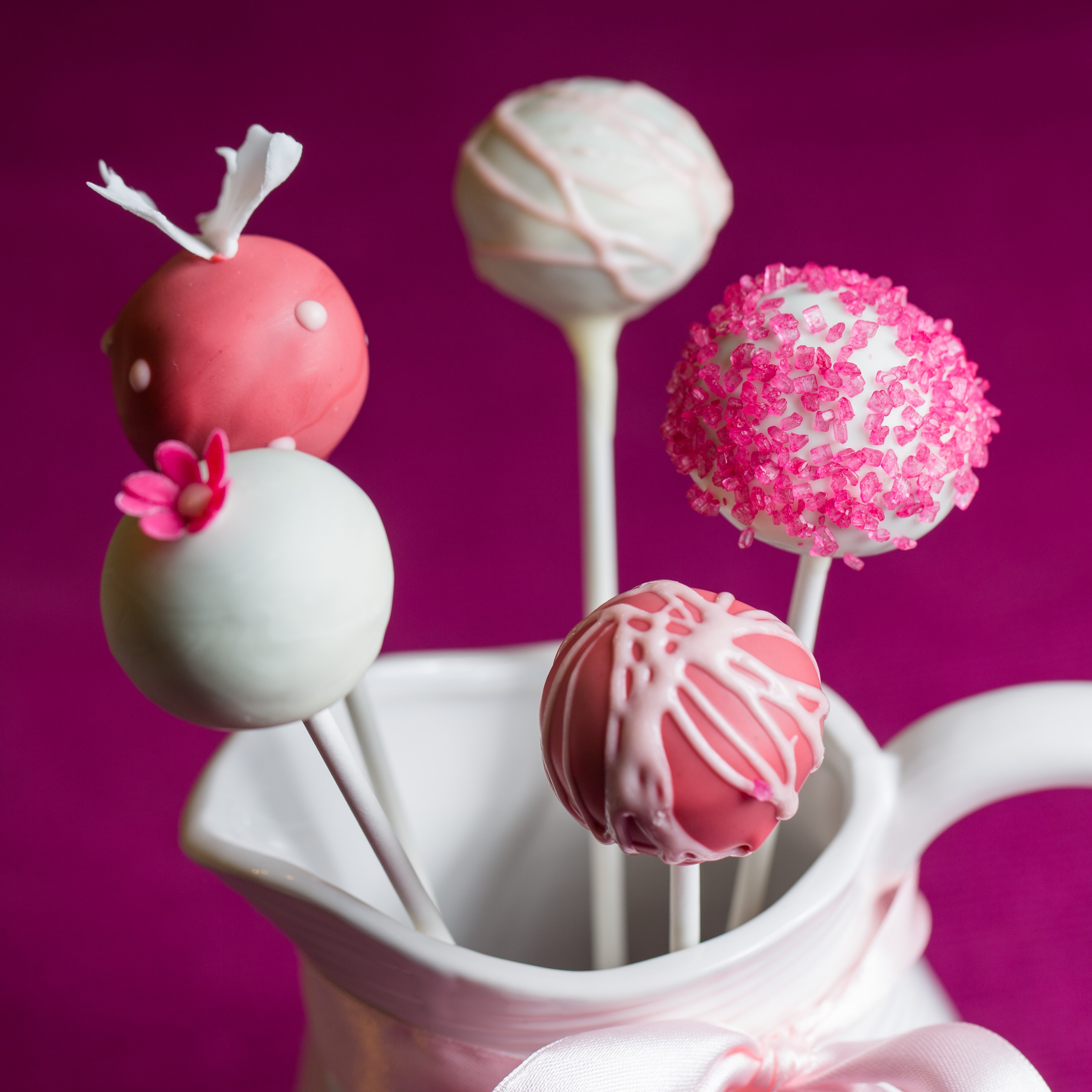 Pink And White Lollipops With Vase Image