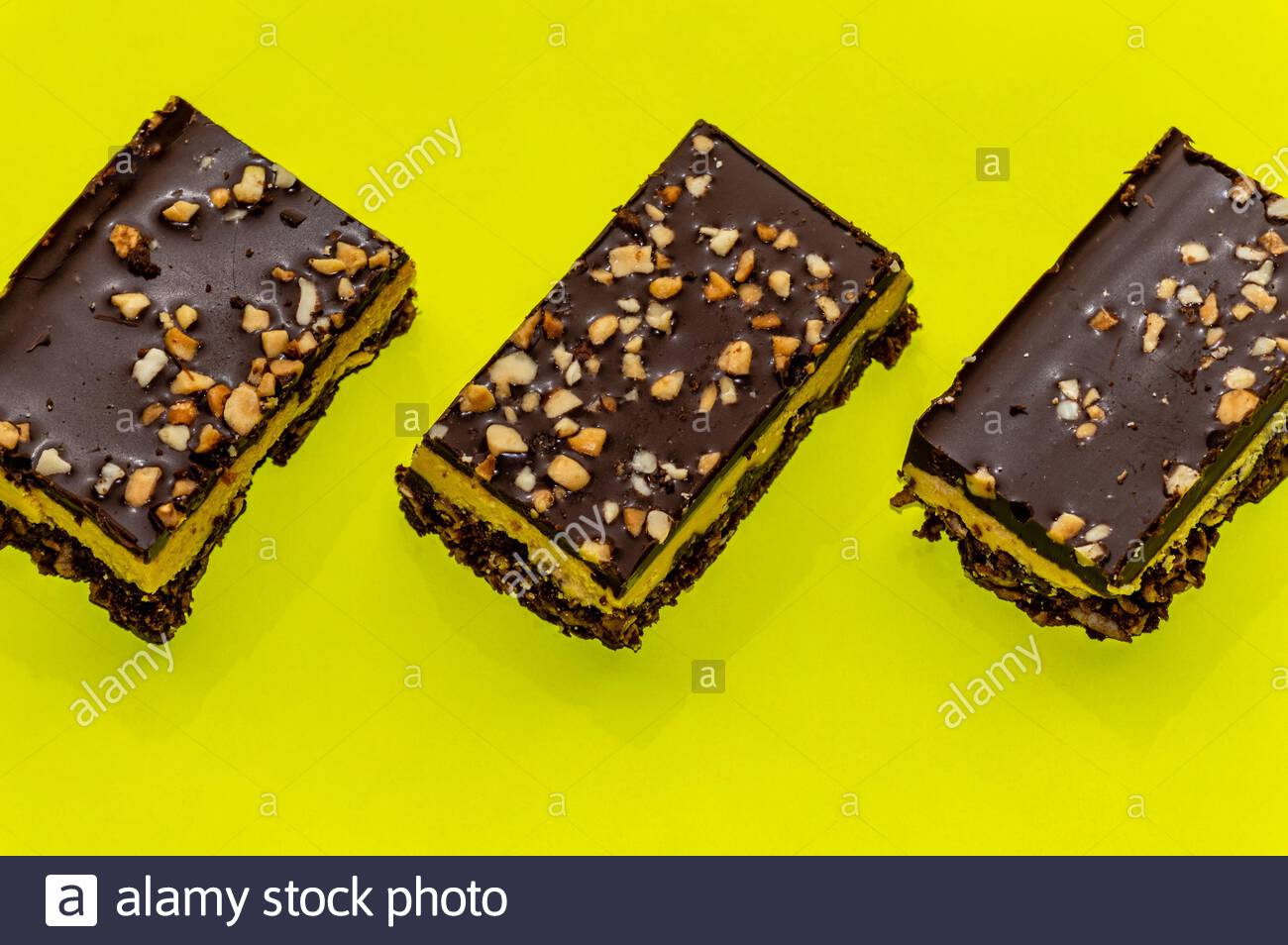 Free download Nutty brownie bars on a yellow background Stock Photo