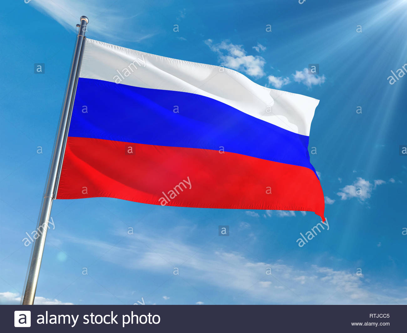 Russia National Flag Waving on pole against sunny blue sky