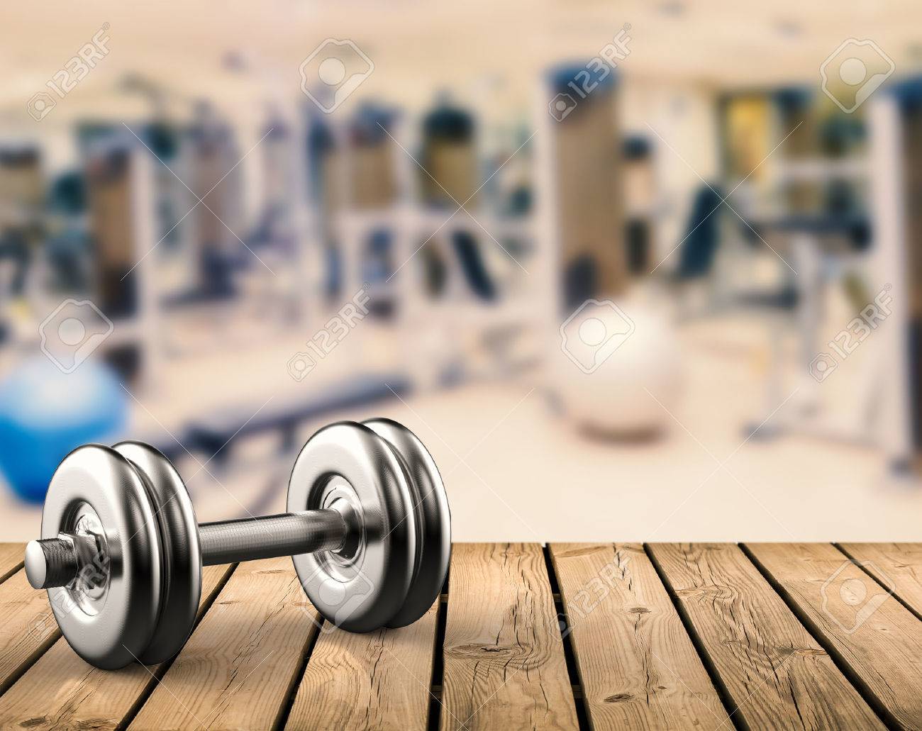 3d Rendering Metal Dumbbell With Gym Background Stock Photo