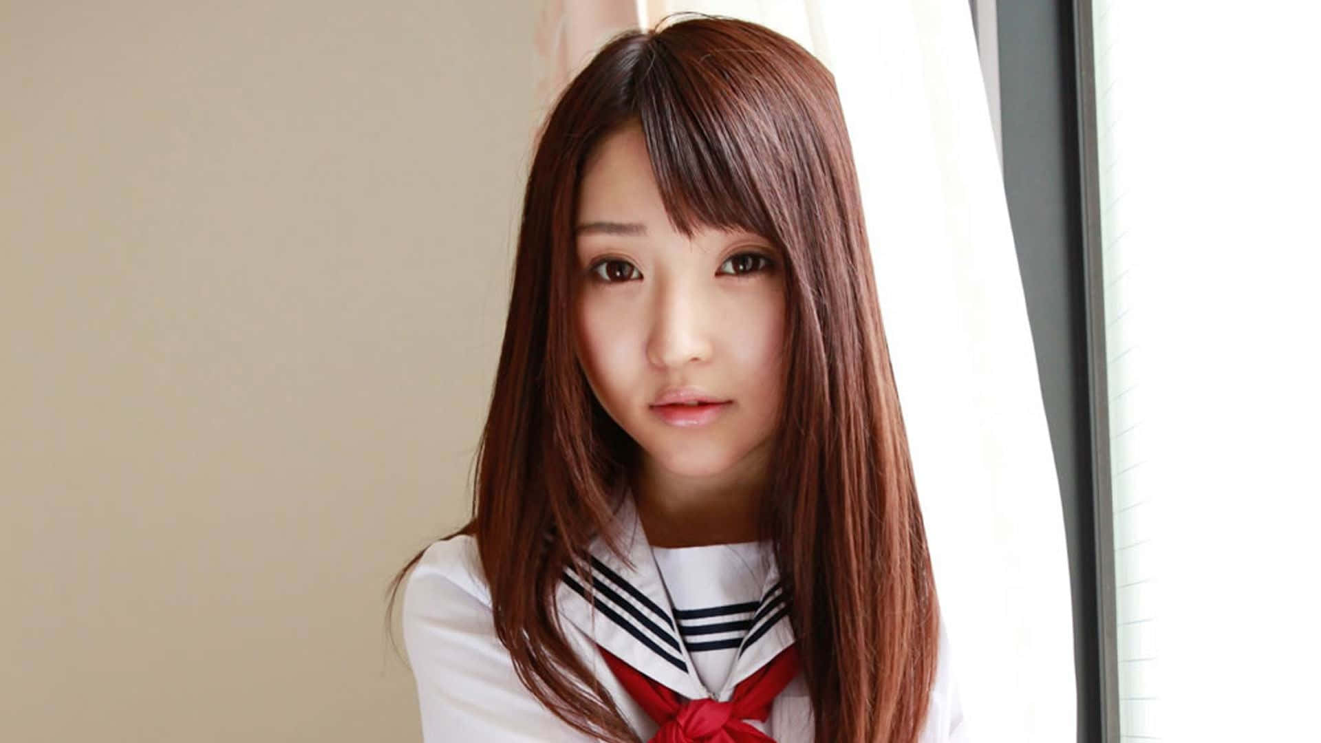 Japanese School Girl Poses Wallpaper