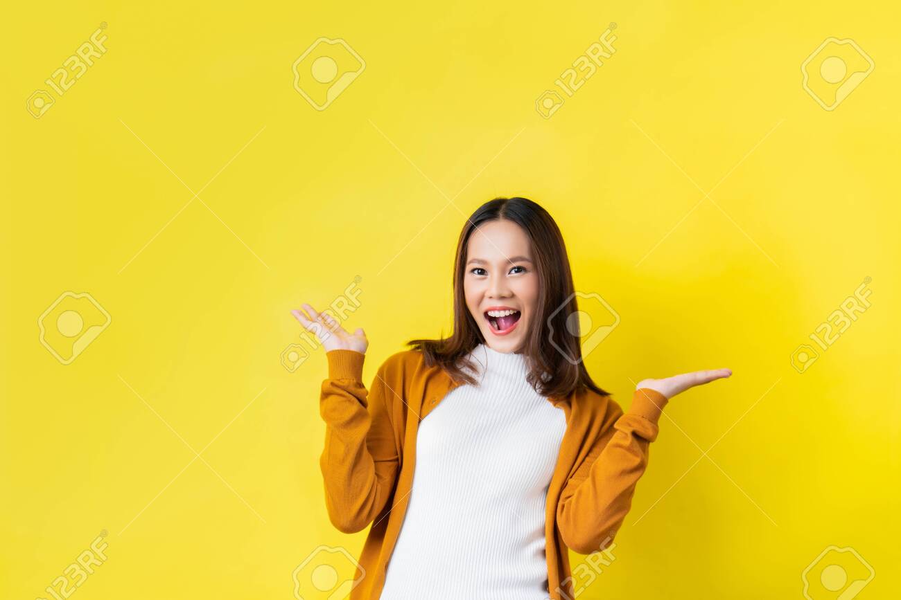 Asian Girl Is Surprised She Excited Yellow Background Studio