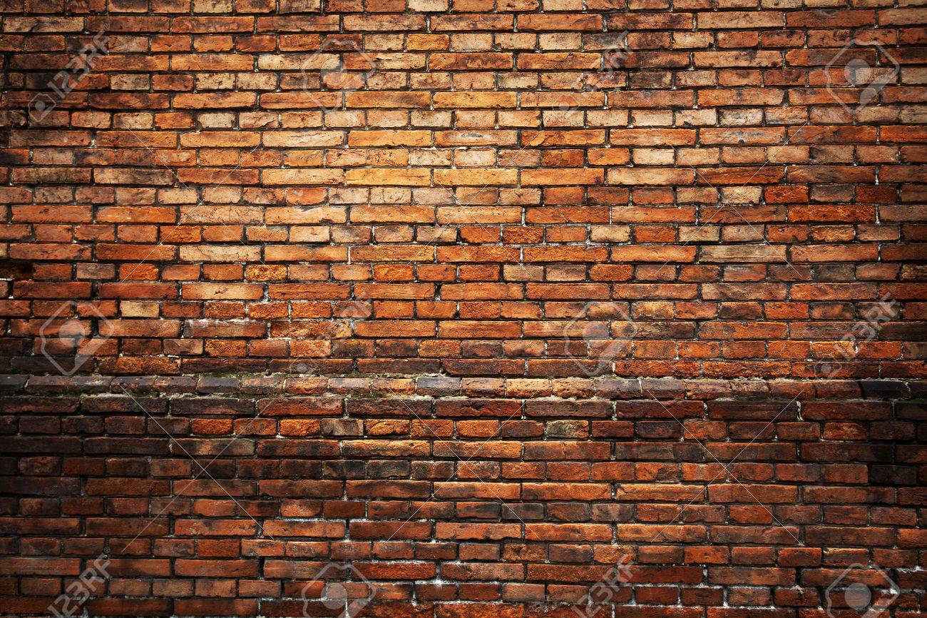 Red Brick Background Closeup Of An Old Uneven Wall Stock