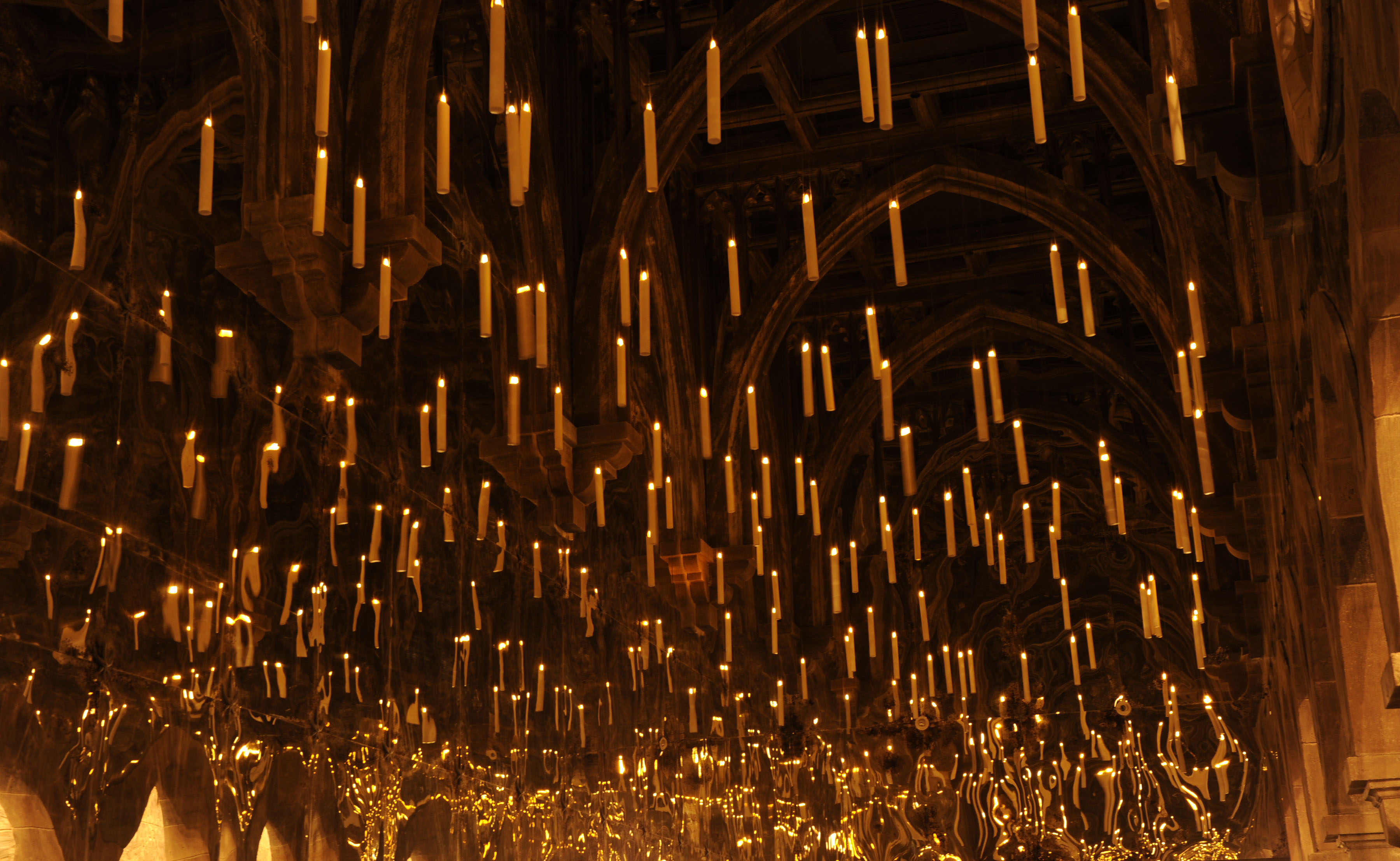 room of requirement where candles float in the air near the ceiling 3600x2213