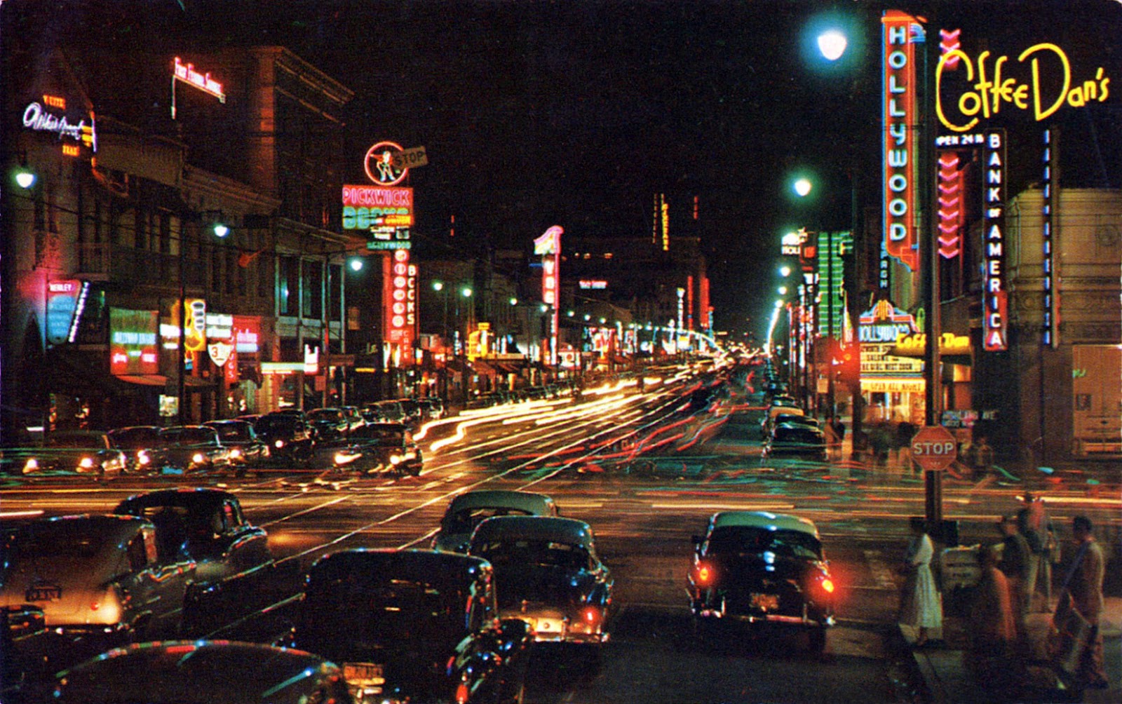 A vintage night scene of Hollywood Boulevard, bustling with classic cars and illuminated by neon signs of iconic establishments like Coffee Dan's