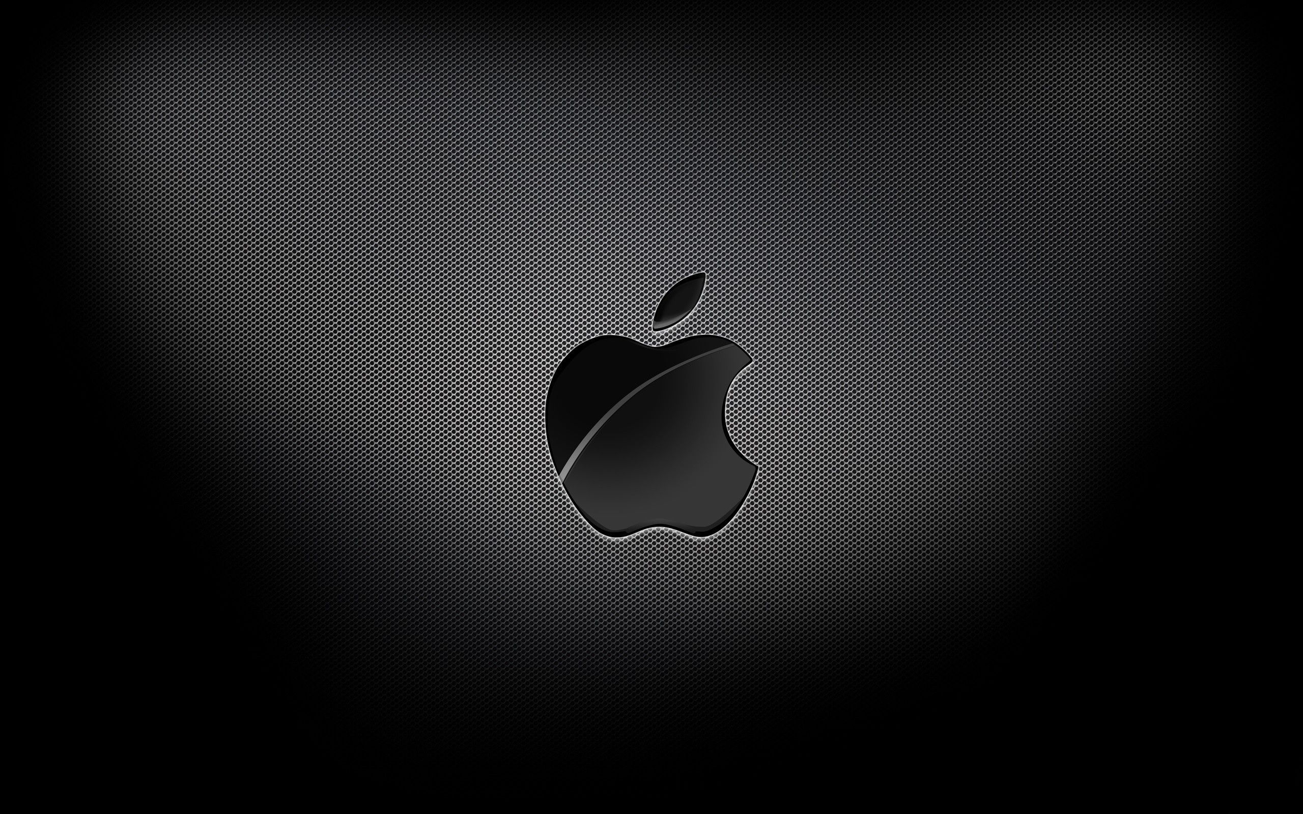 Dark and sleek wallpaper featuring the Apple logo, perfect for a MacBook