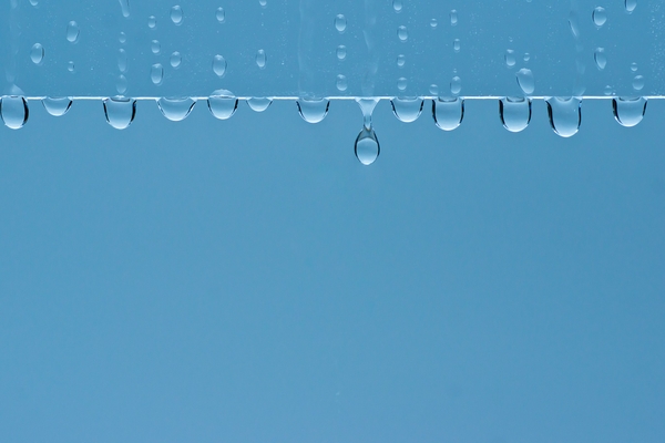 Rain Water Droplets Window Panes Blue Background Wallpaper