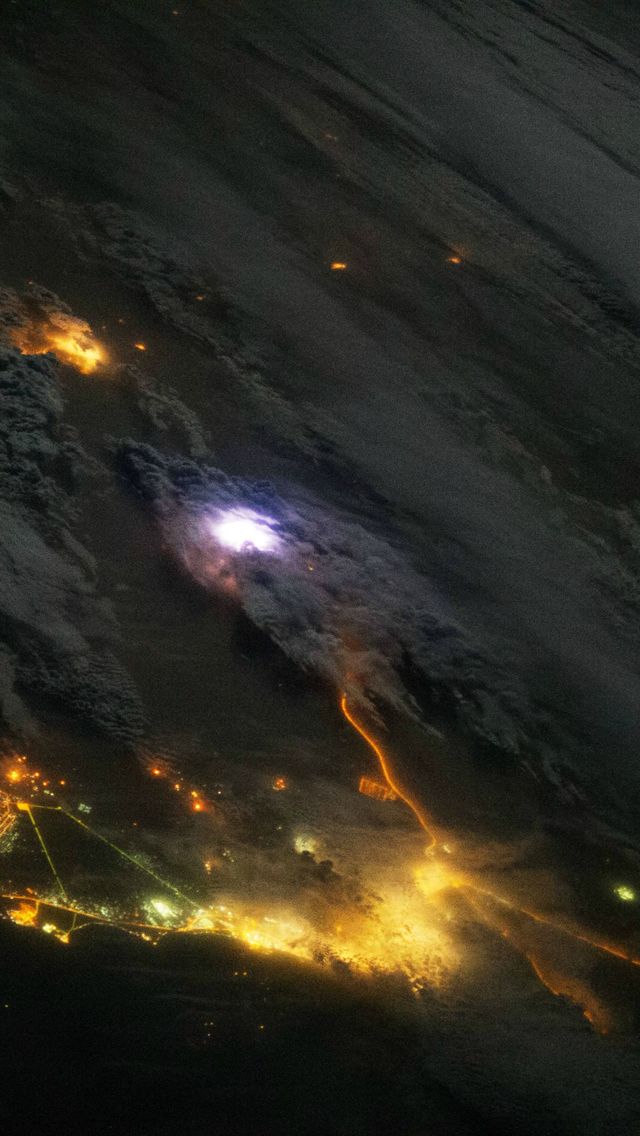Lightning over Arabian Peninsula taken from ISS Wallpaper for iPhone