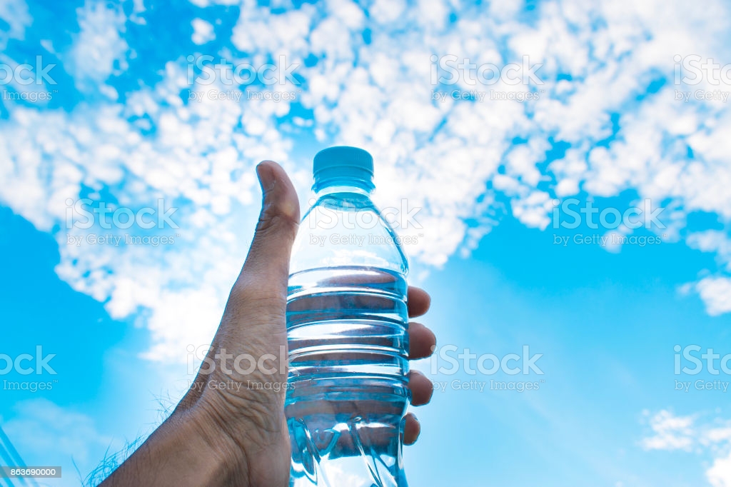 Bottle Water Made To Plastic On Sky Backgroundusing Wallpaper For