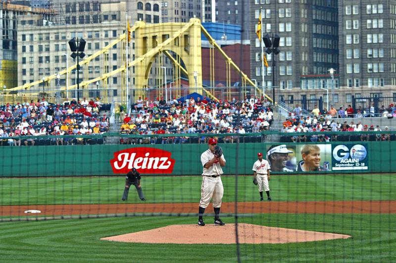The Pnc Park Baseball Stadium With Bridge And City In