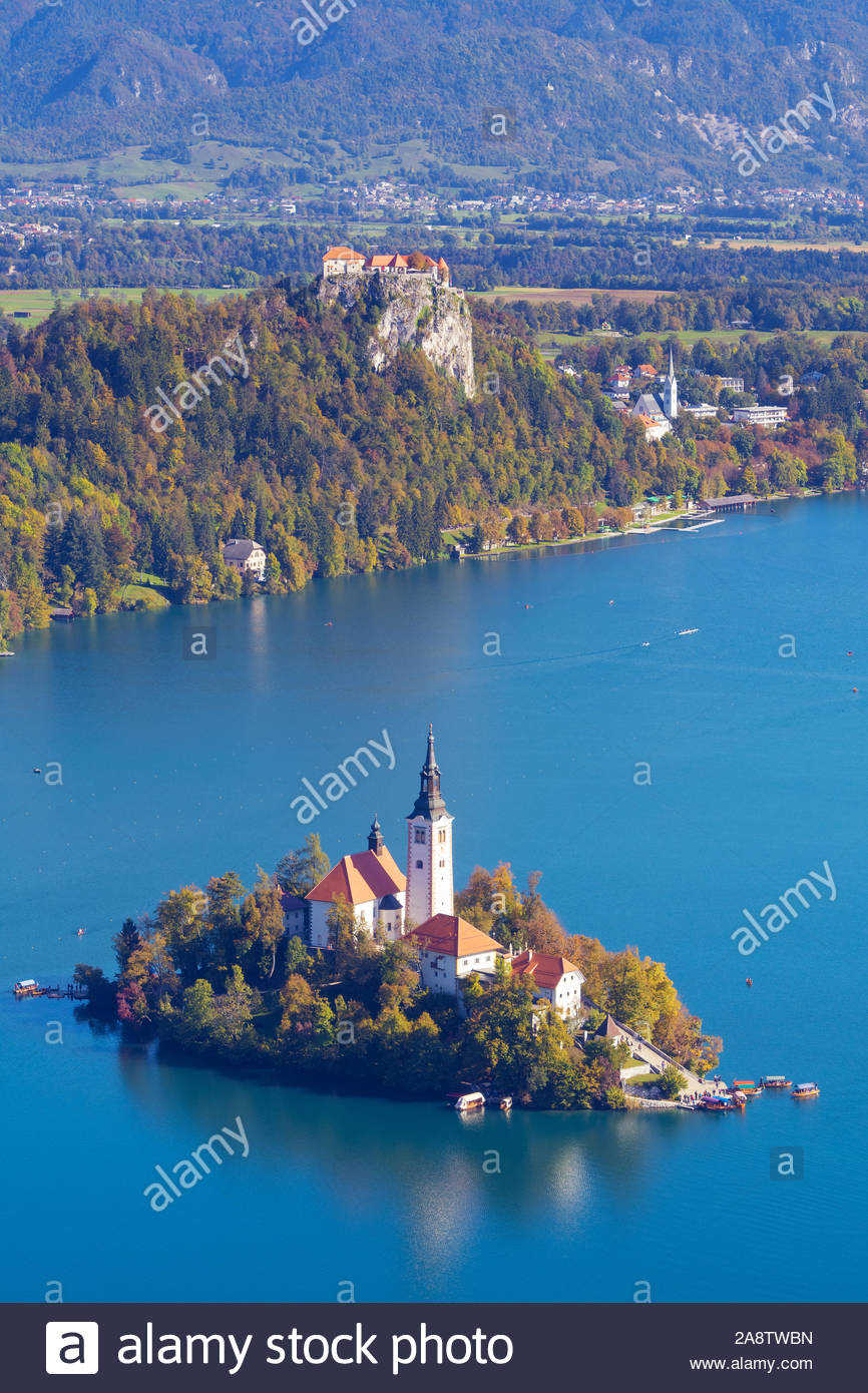 Aerial Of Lake Bled With Island In The Middle And Old Castle