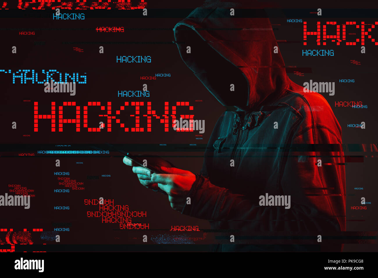 Computer hacking concept with faceless hooded male person using
