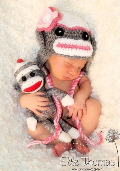 Cute Baby With Sock Monkey Hat And Wallpaper