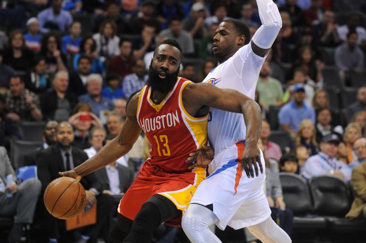 Rockets Shooting Guard James Harden Left Stands As The Wallpaper