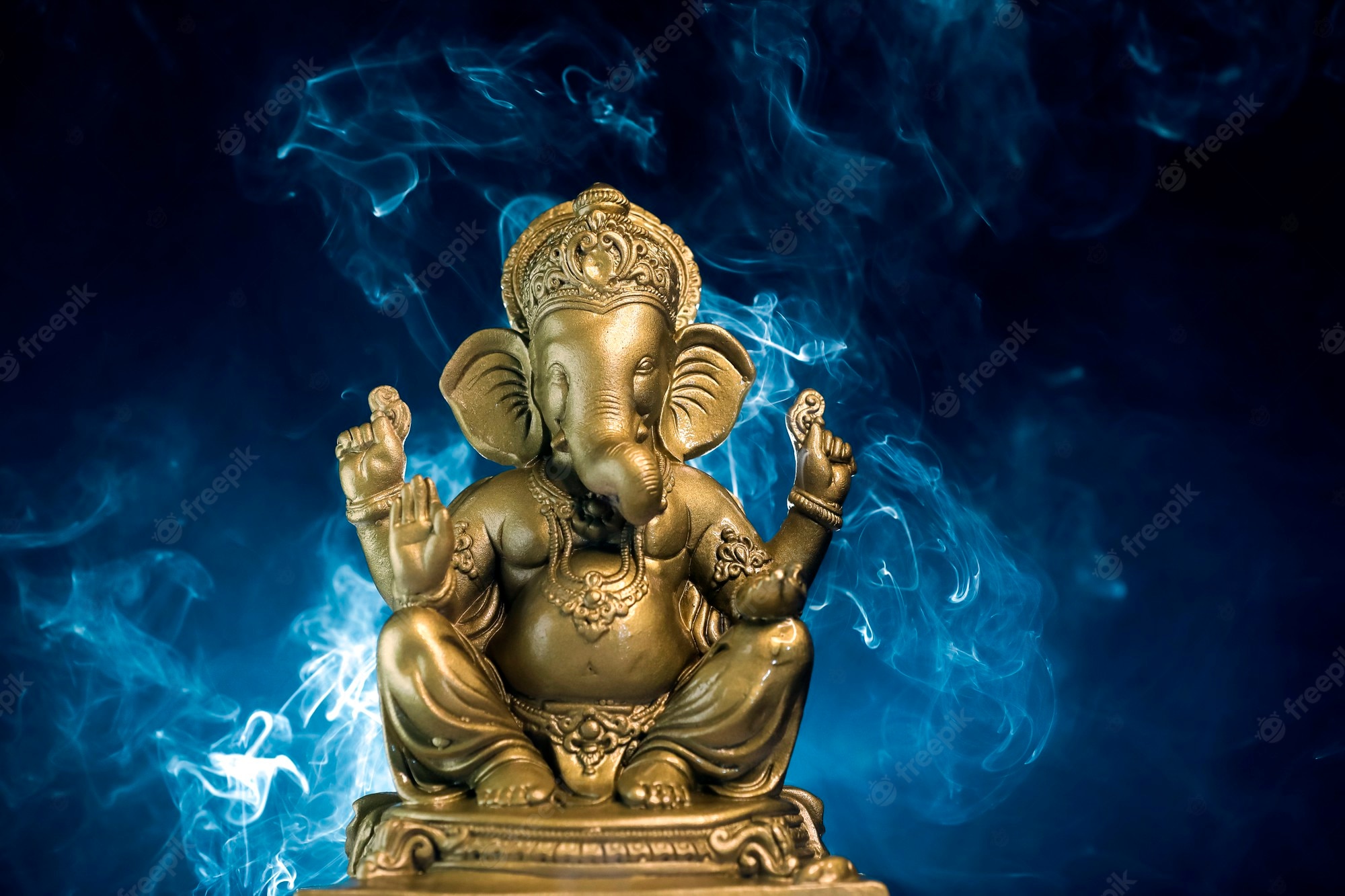 Premium Photo Golden Lord Ganesha Sclupture Over Dark Background