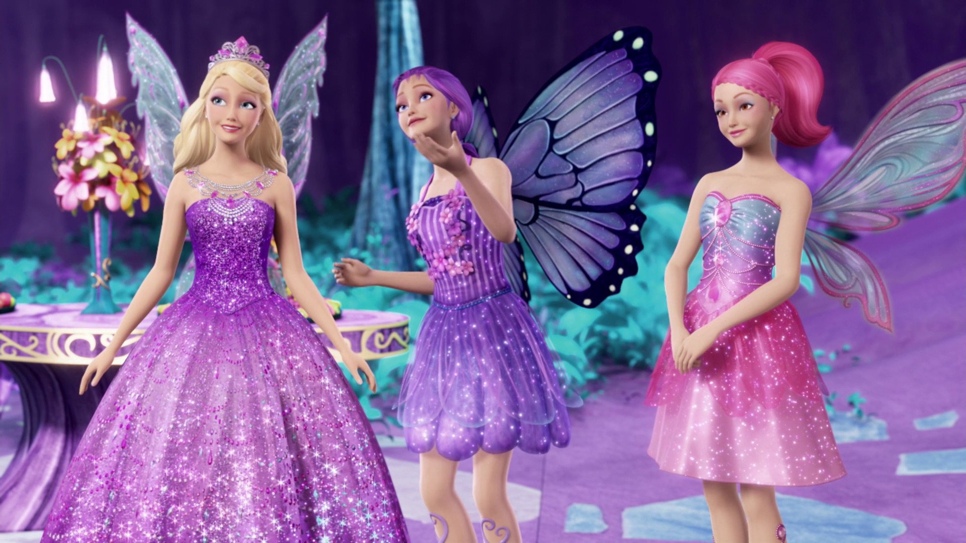 Three Barbie fairies in vibrant dresses, showcasing a magical scene from a Barbie movie