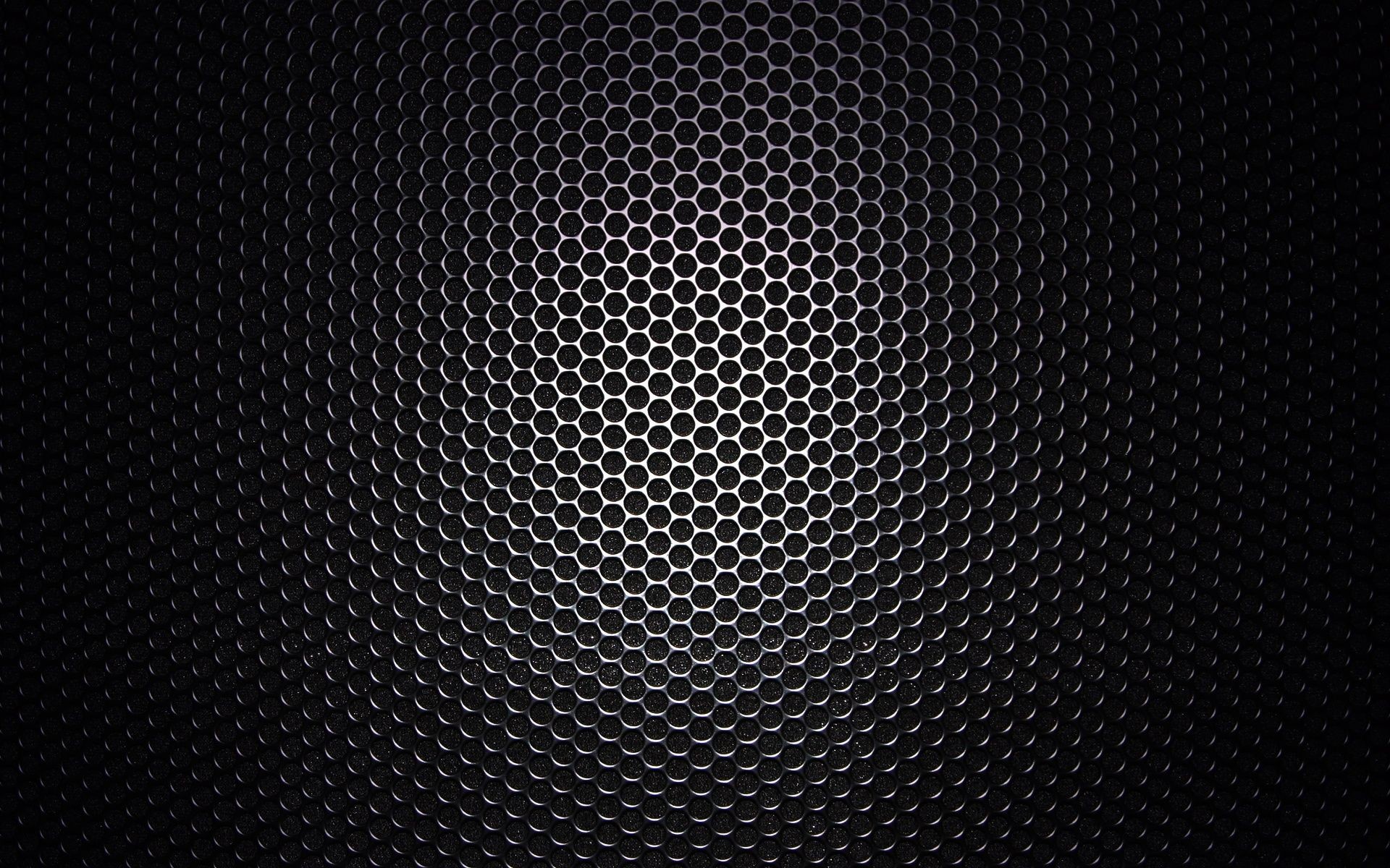 Dark honeycomb mesh texture background for cool black wallpaper
