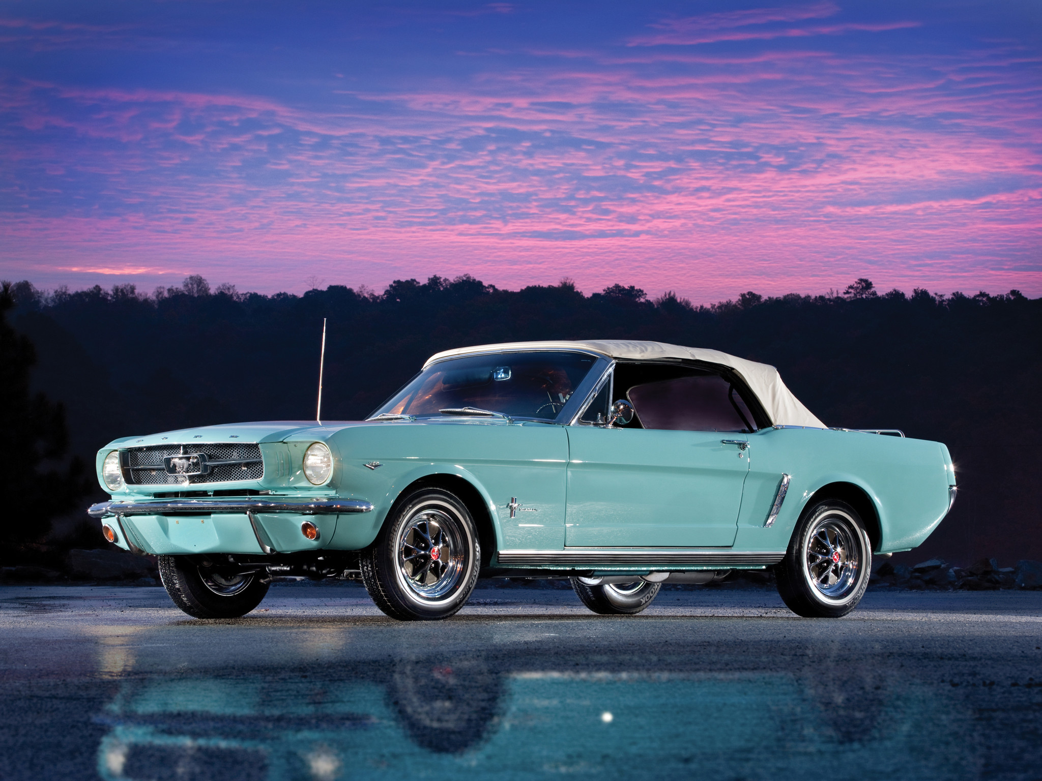 Classic Teal Ford Mustang Convertible at Sunset