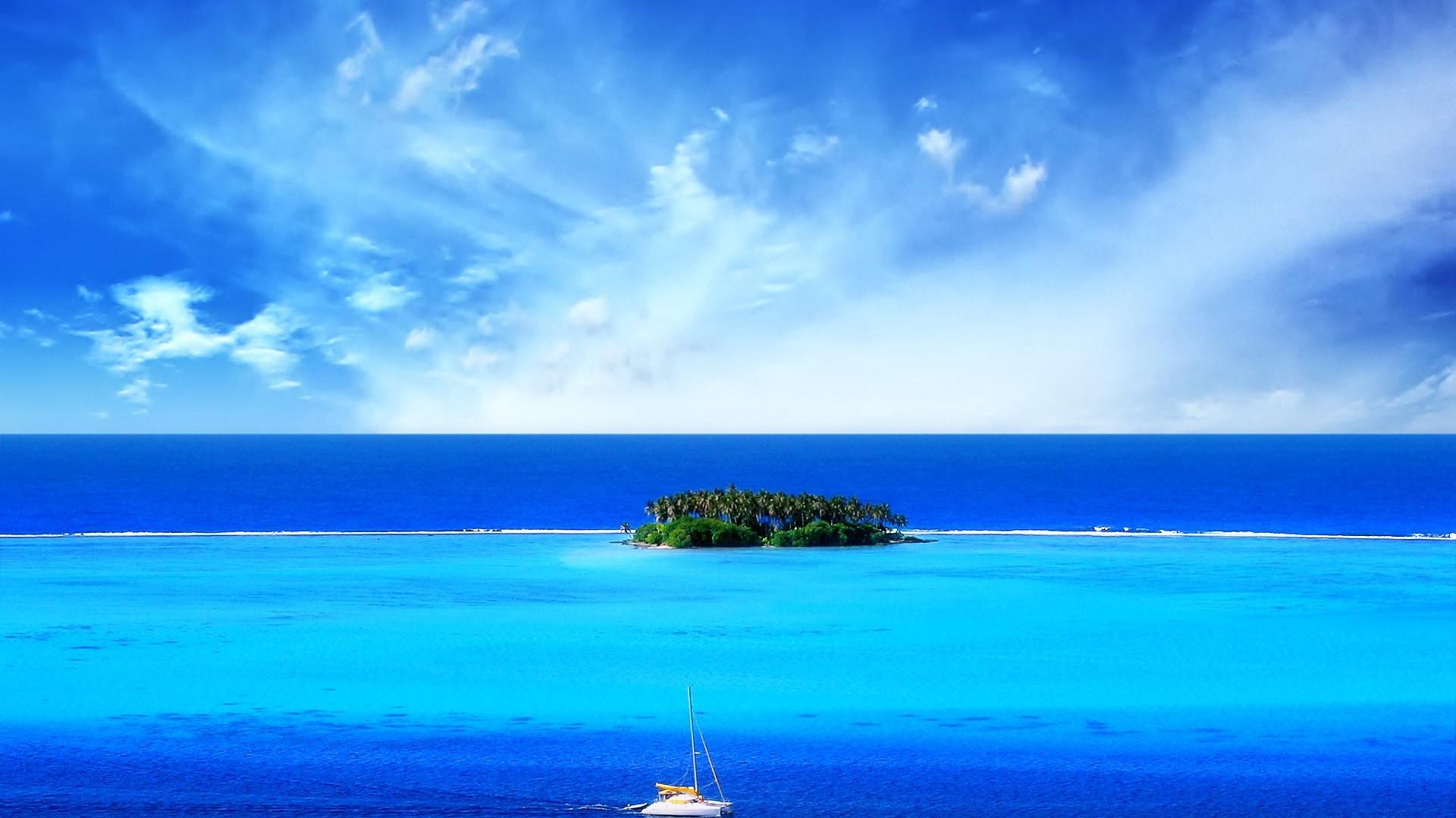 Summer Holiday Wonderful Blue Ocean Water And Small Island