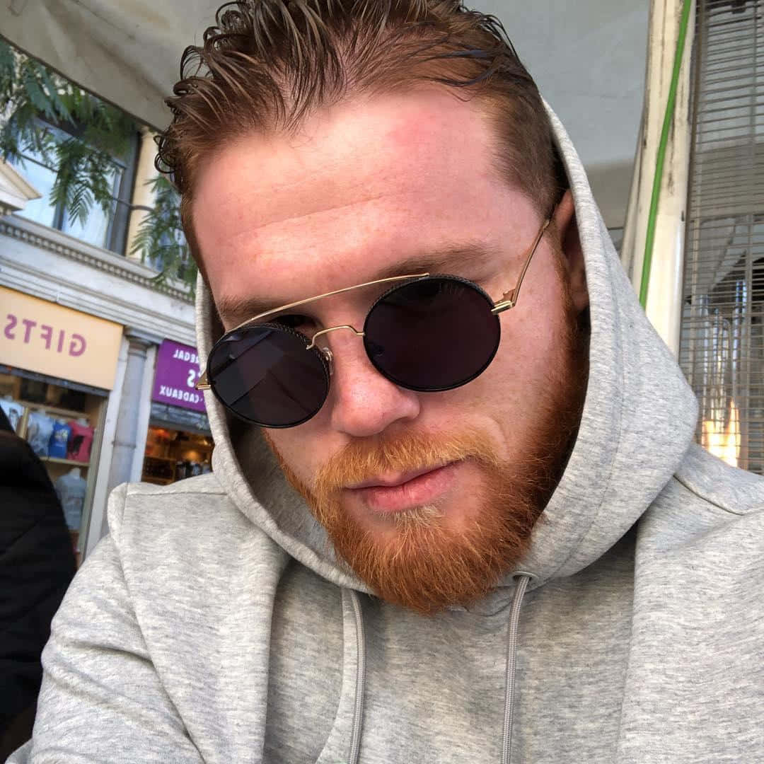 Champion Boxer Saul Canelo Alvarez Posing For A Selfie Wallpaper