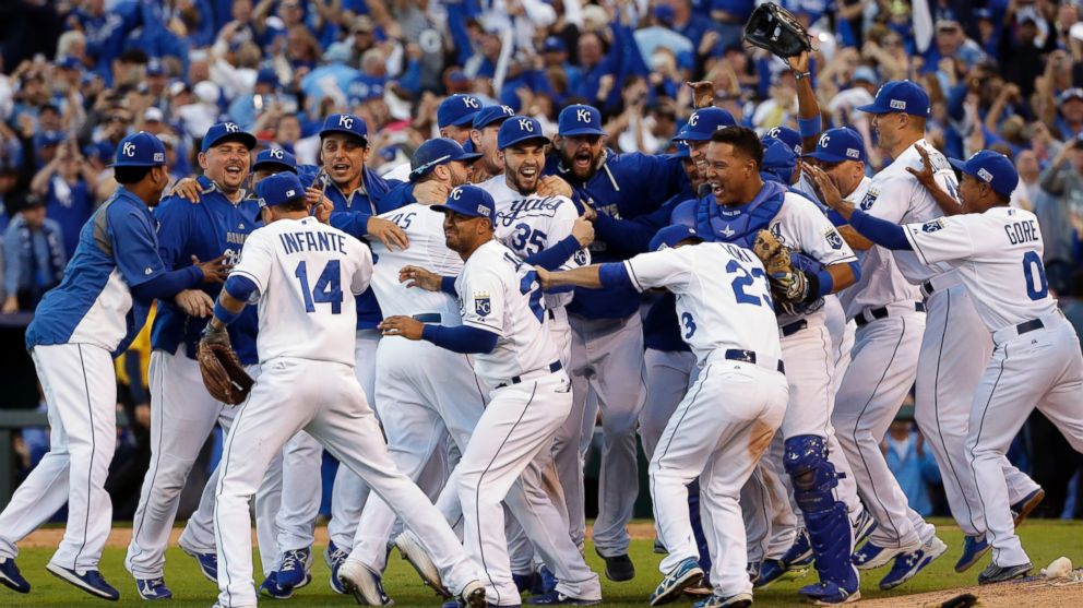 the kansas city royals players celebrate after the royals defeated the