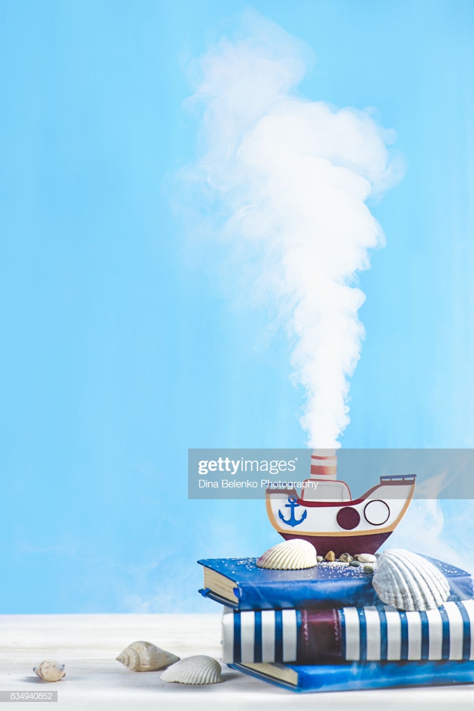 Steam Engine Papercraft Still Life With Tiny Steamboat On A Pastel