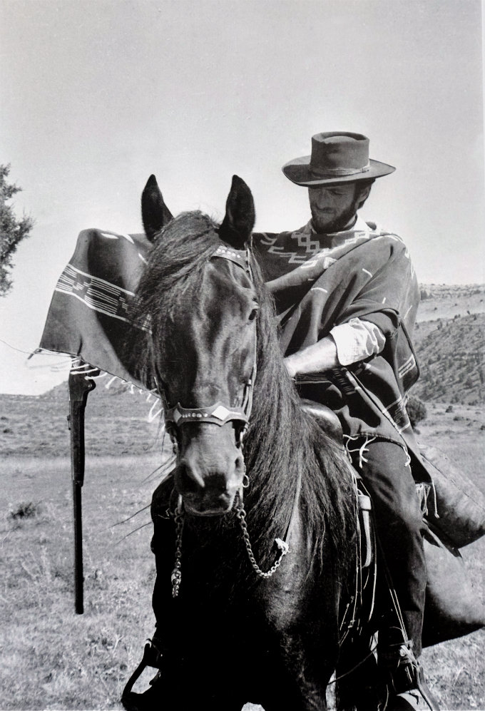 Clint Struggling With His Rifle And Poncho Eastwood Photo