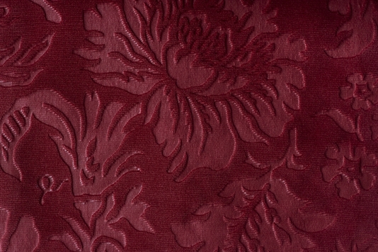 Velvet Damask A lovely rich red velvet with a gaufraged floral damask