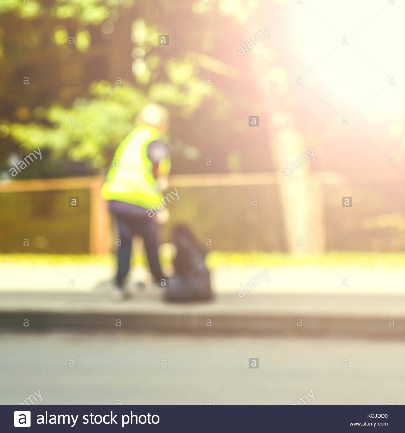 Abstract Blurred Background Road Sweeper Worker Cleaning City