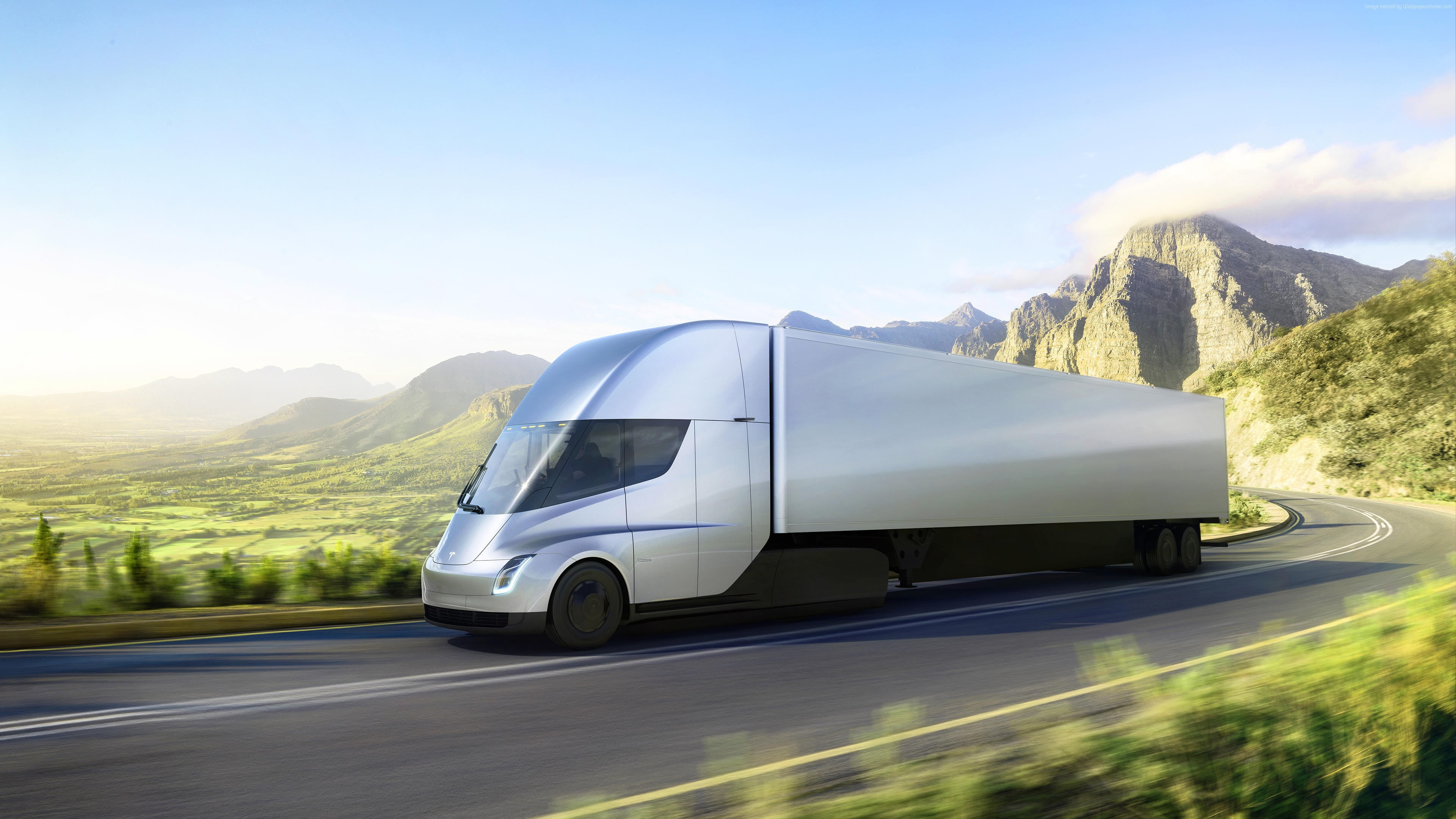 Time lapse photography of silver freight truck concept running on