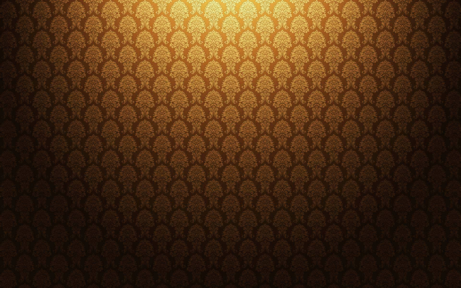 Dark brown damask wallpaper background with subtle gold pattern, evoking a vintage and luxurious feel