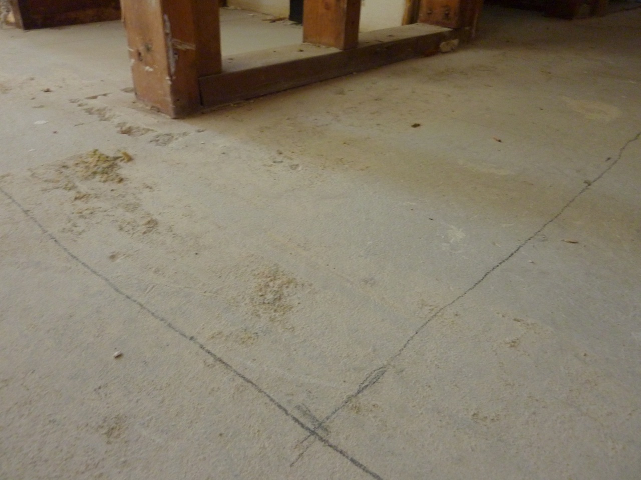 concrete floor marked out for cutting
