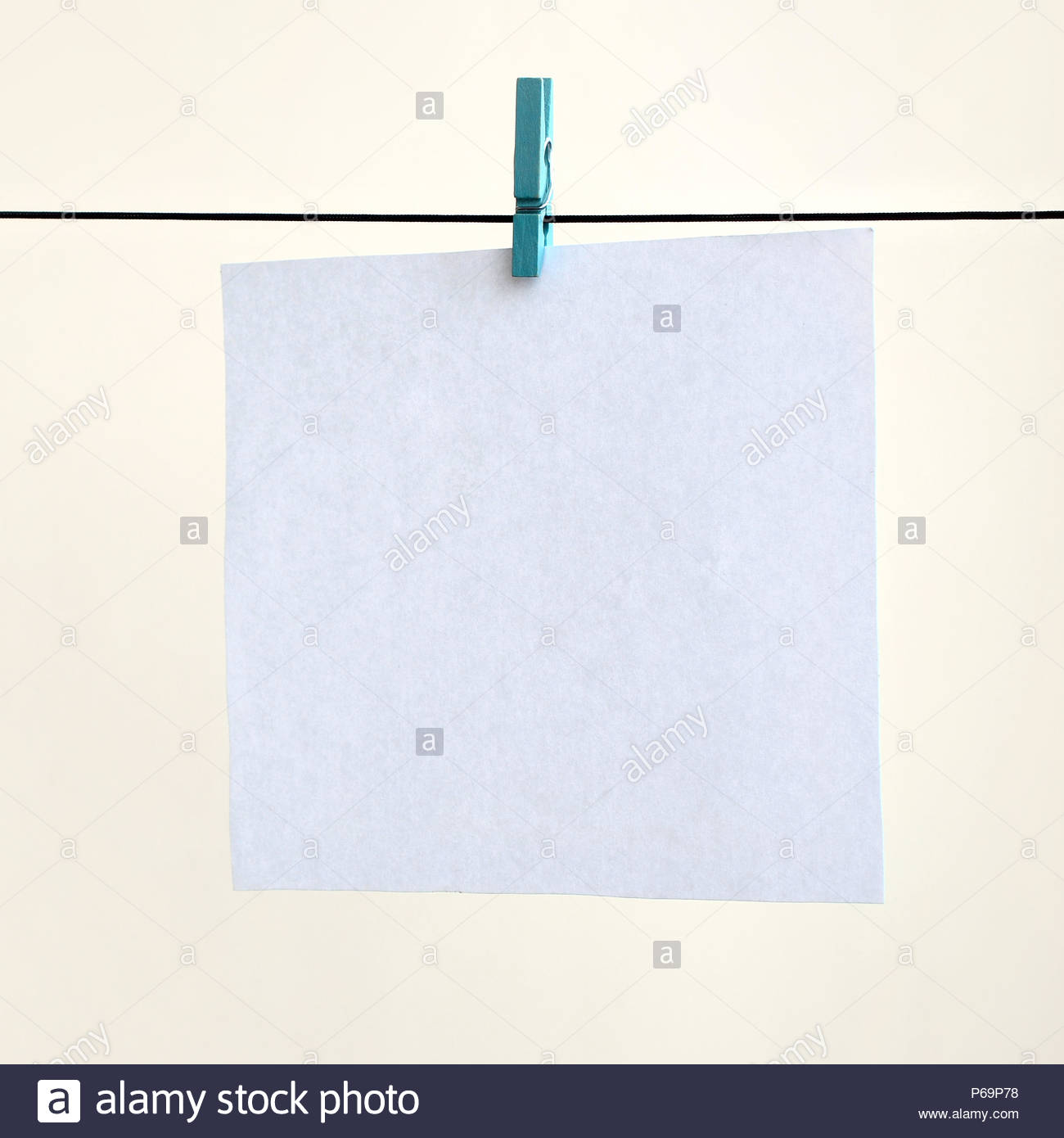 White Blank Cards On Rope Light Wall Background Creative