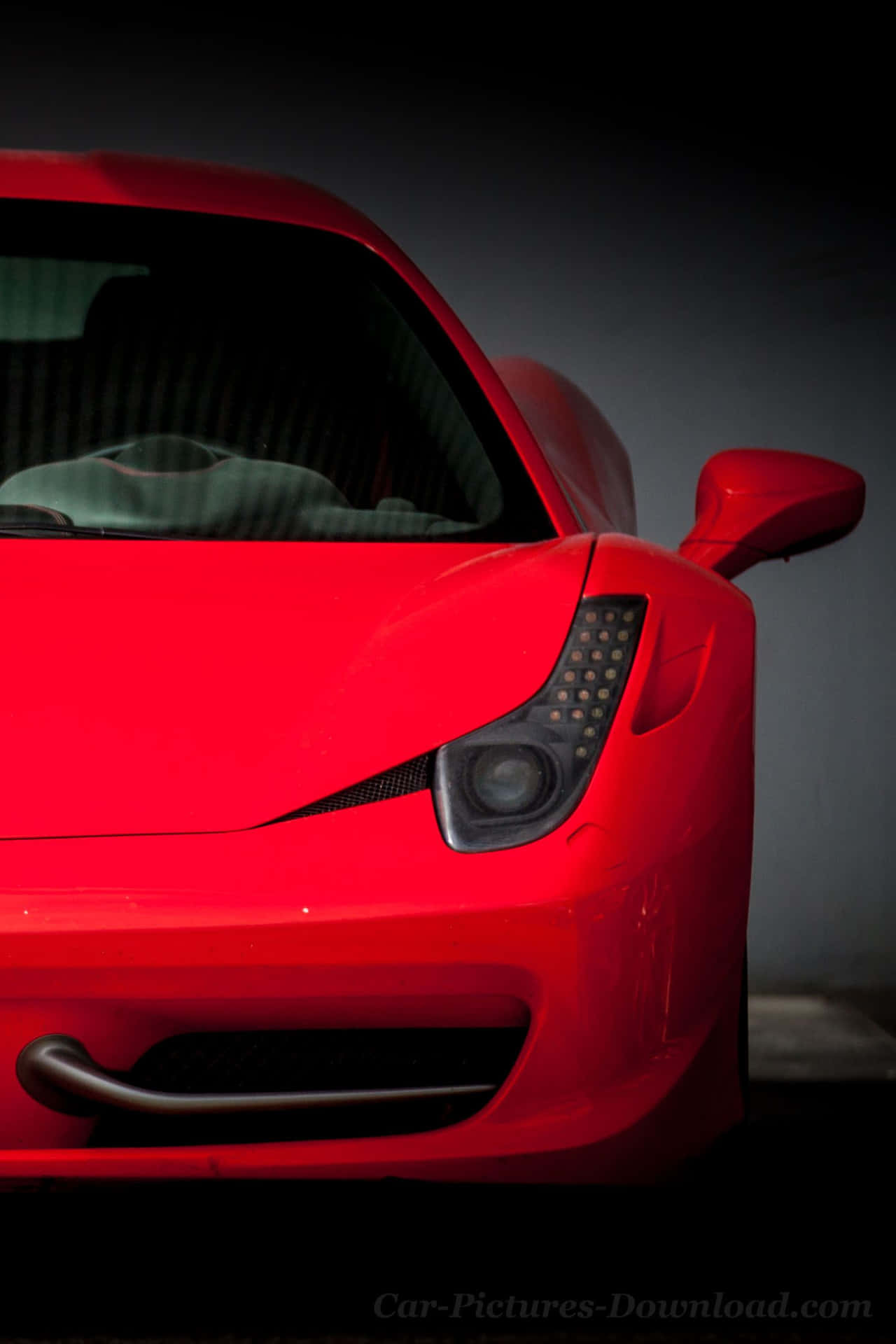 This Red Car Looks Amazing On The New iPhone Wallpaper