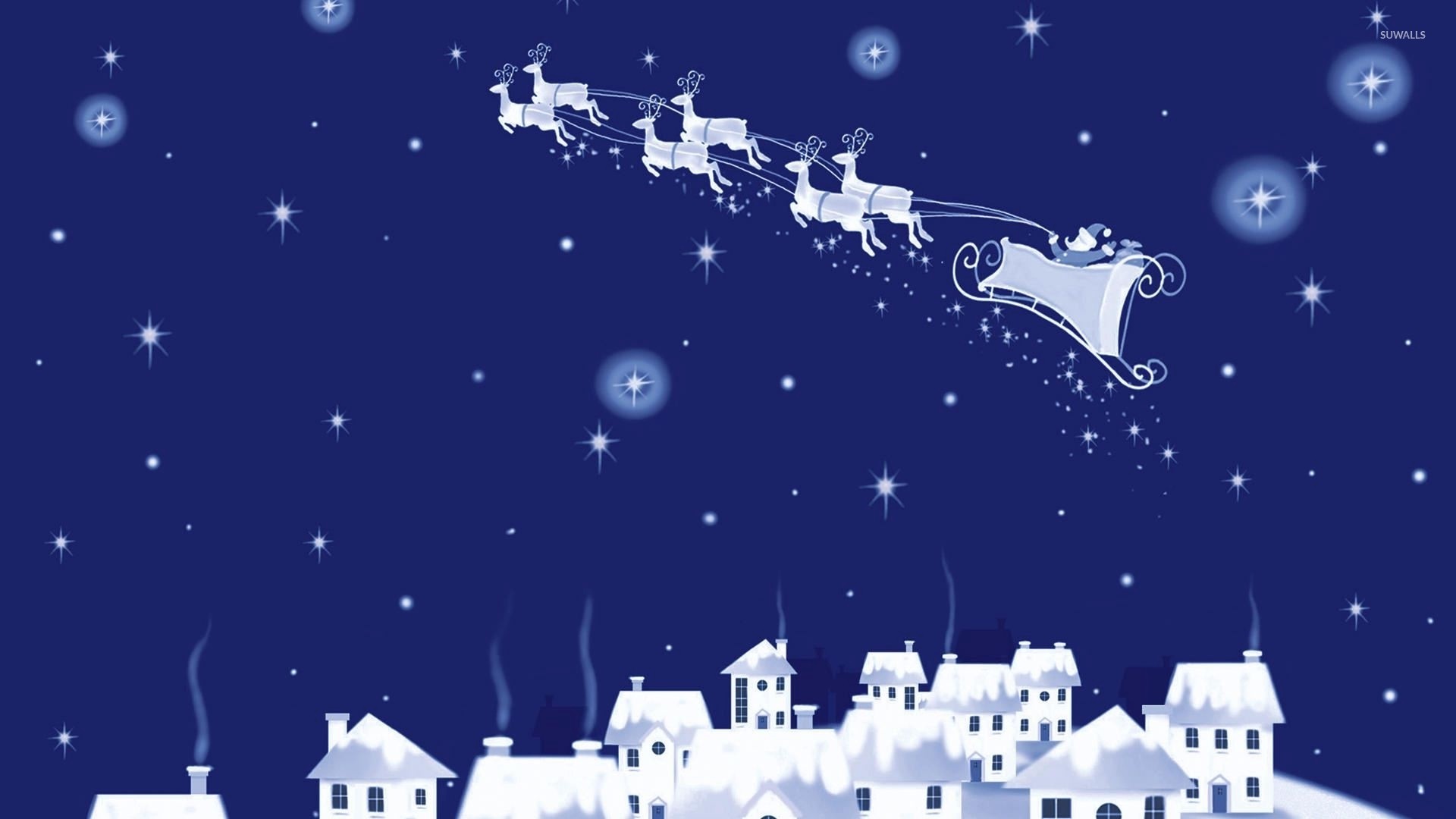Santa Claus flying over a snowy village on Christmas Eve