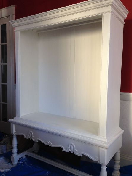 Here is the cupboard almost completed The wainscoting is in place and