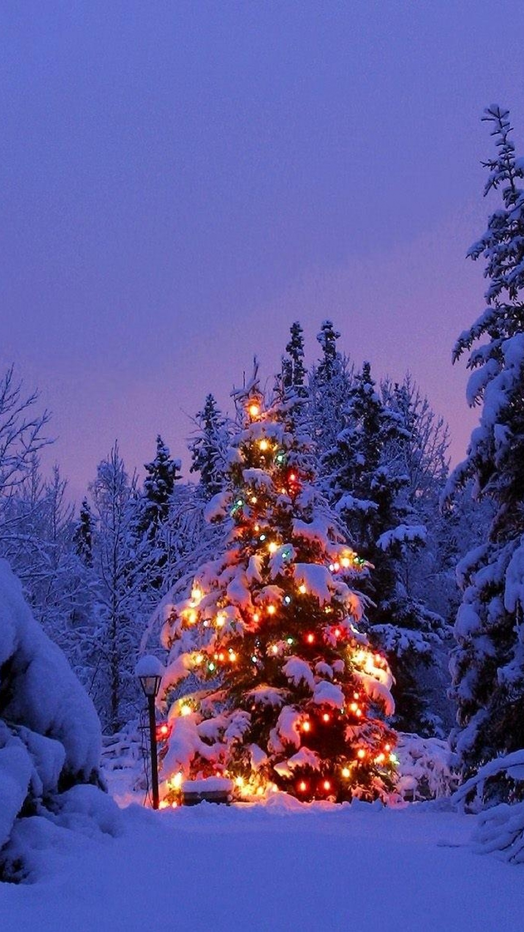 Snowy Decorated Christmas Tree Android Wallpaper free download