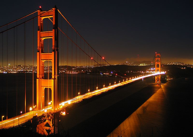 The Golden Gate Bridge by night with part of downtown San Francisco