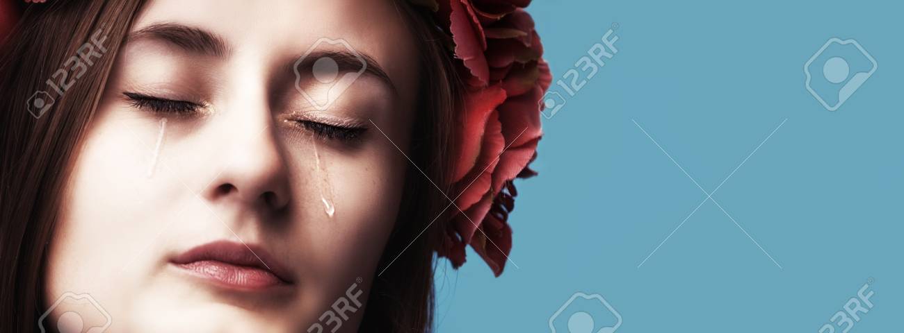 Close Up Portrait Of Beautiful Crying Girl With Tears On Her